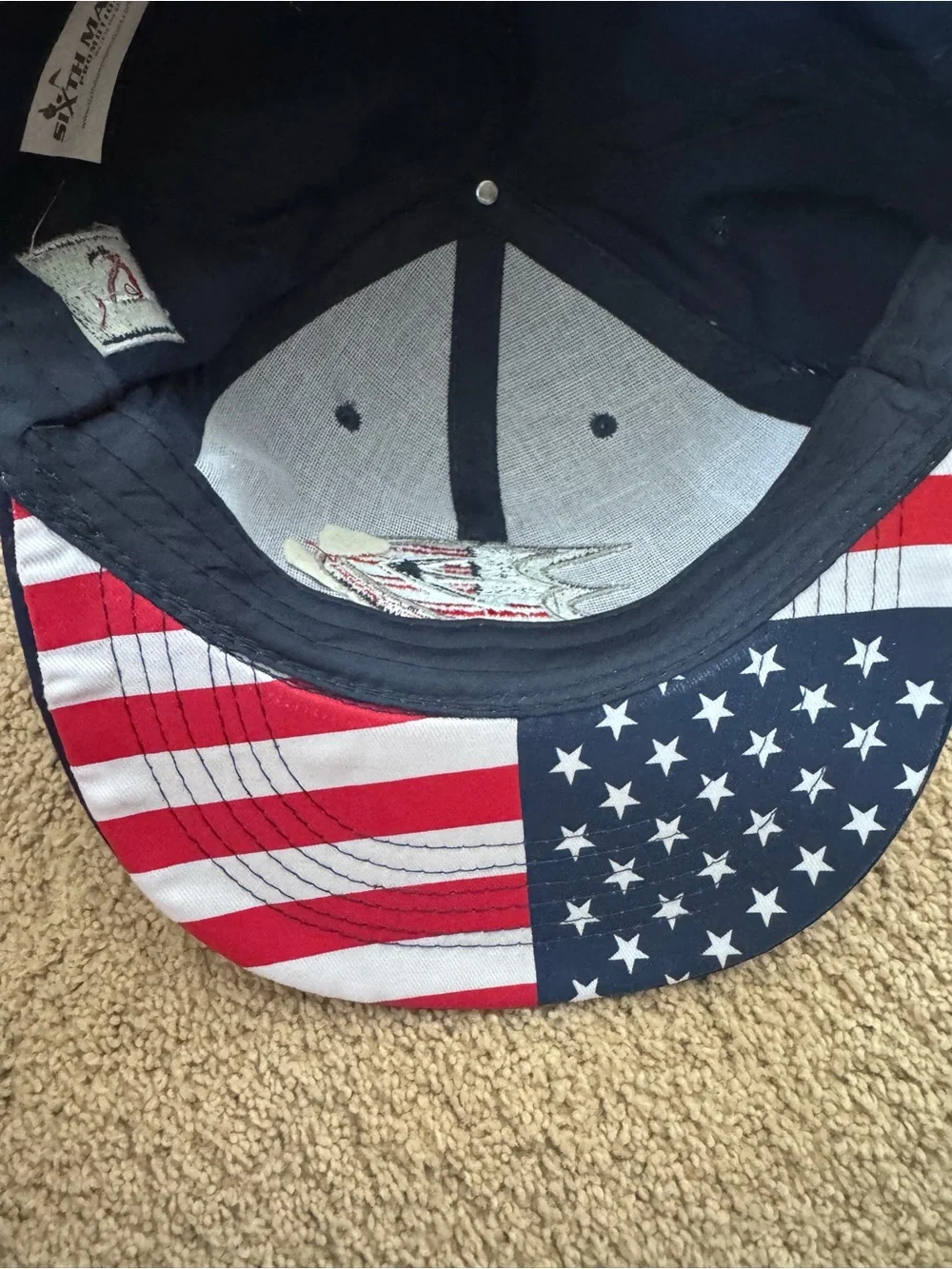 NWOT Anaheim Ducks red, white and blue hat with American Flag Print.